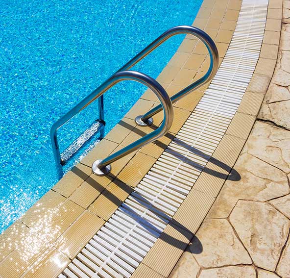 Stained concrete around a pool.